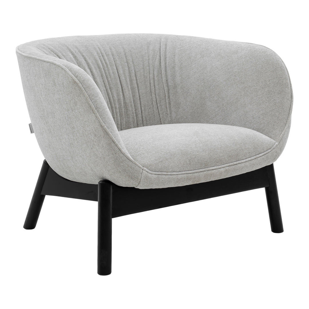 Gray upholstered armchair with subtle ribbed pattern and black wooden legs. Ideal for modern decor.