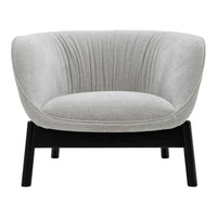 Light gray plush upholstered chair with vertical pleats and sleek black wooden legs. Modern and stylish accent piece.