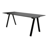 Sleek black rectangular table with minimalist design and angled legs, perfect for modern home or office decor.