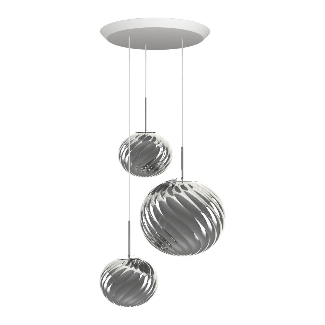 Three metallic pendant lights in silver finish, featuring elegant swirling patterns for a modern look.