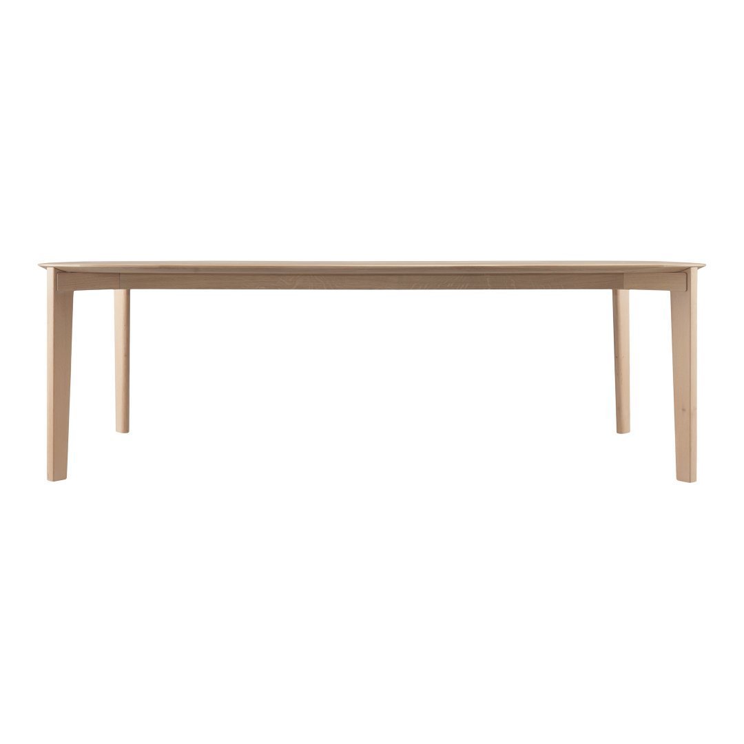 Light wood dining table with a smooth, natural finish and clean, minimalist design. Ideal for modern interiors.