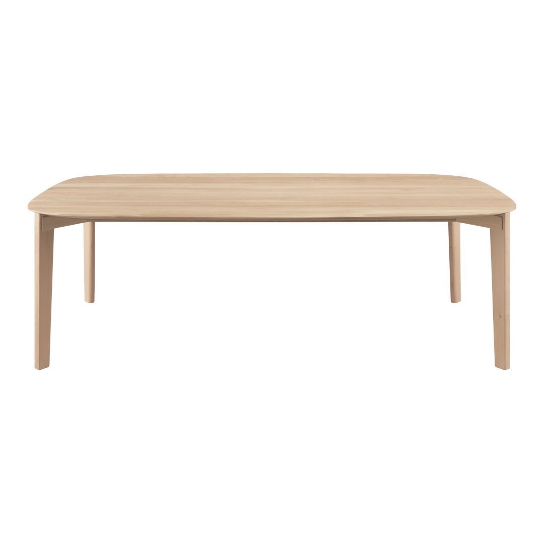 Light natural wood rectangular dining table with smooth, minimalist design and rounded edges. Ideal for modern interiors.