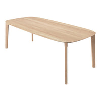 Light natural wood dining table with a smooth, oval shape and simple, minimalist design. Ideal for contemporary decor.