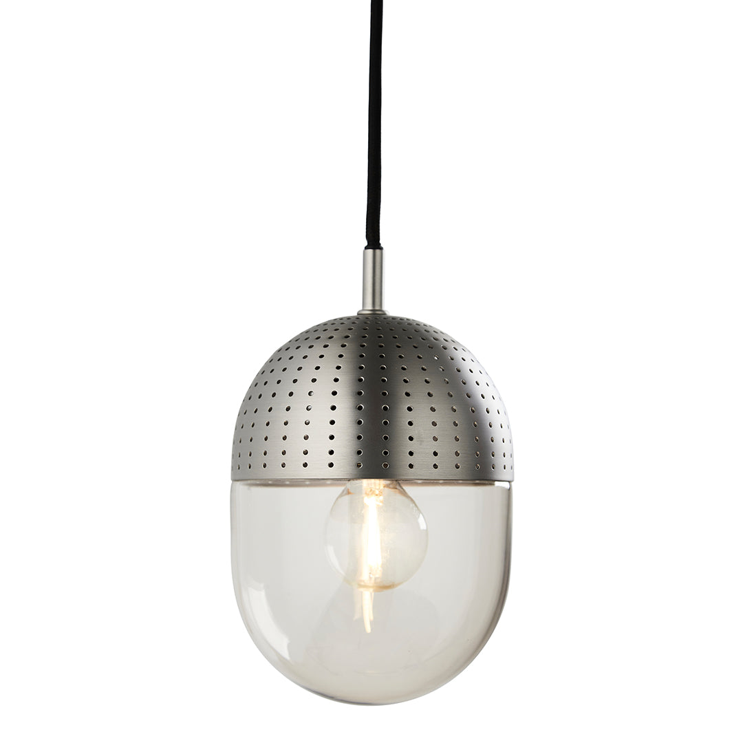 Modern pendant light featuring a silver perforated shade and clear glass bottom, creating a sleek, contemporary look.
