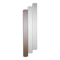 Three sleek, rectangular color swatches in gradient shades of silver, gray, and bronze, showcasing a modern design.