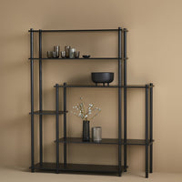 Modern black metal shelving unit with sleek, minimalist design against a warm beige background.