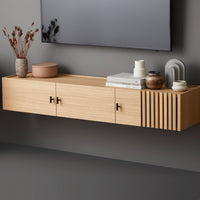Light wood floating shelf with slatted design; neutral decor accents in soft beige and earthy tones.