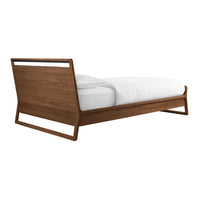 Modern wooden bed frame in rich walnut finish with clean lines and minimalistic design, featuring a white mattress.