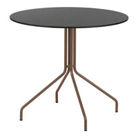 Round black tabletop with a sleek brown metal base. Perfect blend of modern style and versatility.