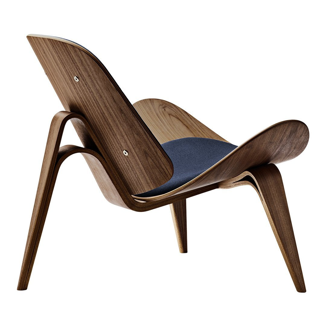 Stylish wooden lounge chair with a rich walnut finish and a deep blue upholstered seat.