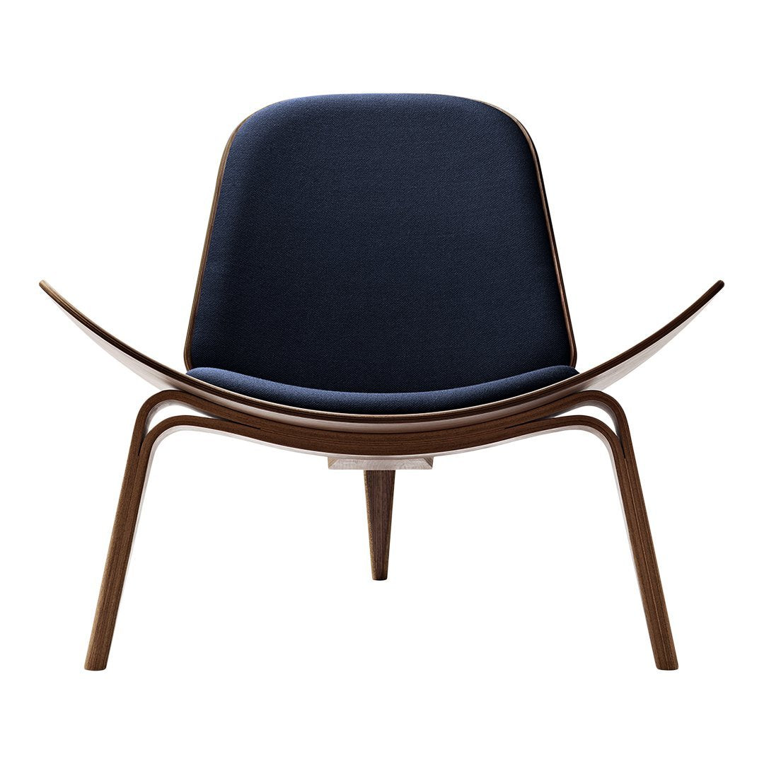Navy blue upholstered chair with smooth wood accents, featuring a minimalist, contemporary design.