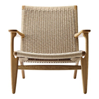 Beige woven chair with natural wood accents, featuring a minimalist design and textured fabric. Perfect for modern decor.