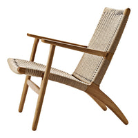 Natural woven beige fabric with light wood accents, featuring a minimalist design and clean lines.