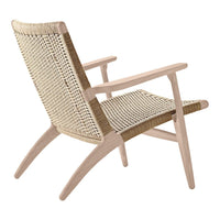 Natural wooden chair with a woven straw seat and backrest, featuring light beige and soft tan tones. Stylish and modern design.