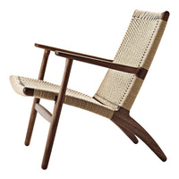 Natural woven beige seat with dark wood accents in a minimalist design. Perfect for modern decor.