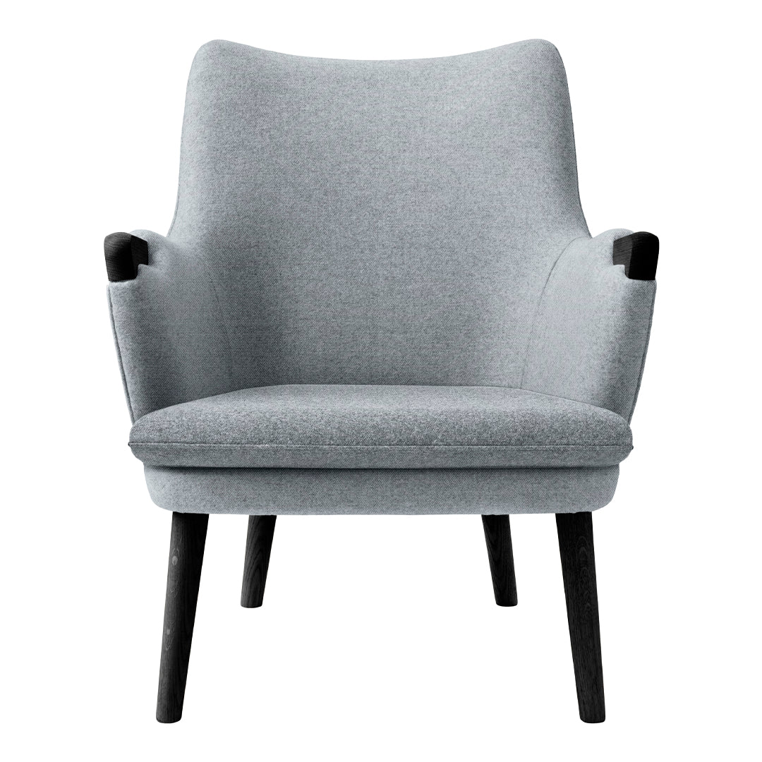 Gray upholstered armchair with sleek, minimalist design and black wooden legs. Soft texture enhances modern aesthetics.