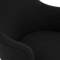 Black upholstered armchair with a smooth, minimalist design and subtle texture. Ideal for modern decor.
