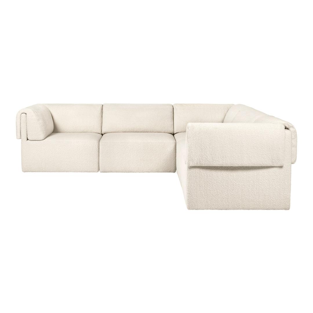 Light beige sectional sofa with smooth, clean lines and subtle textured detailing. Ideal for modern decor.