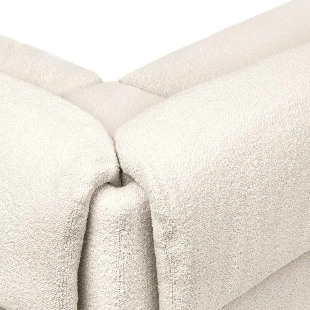 Neutral cream-colored plush fabric with a soft, textured surface and subtle seam detail. Perfect for cozy interiors.