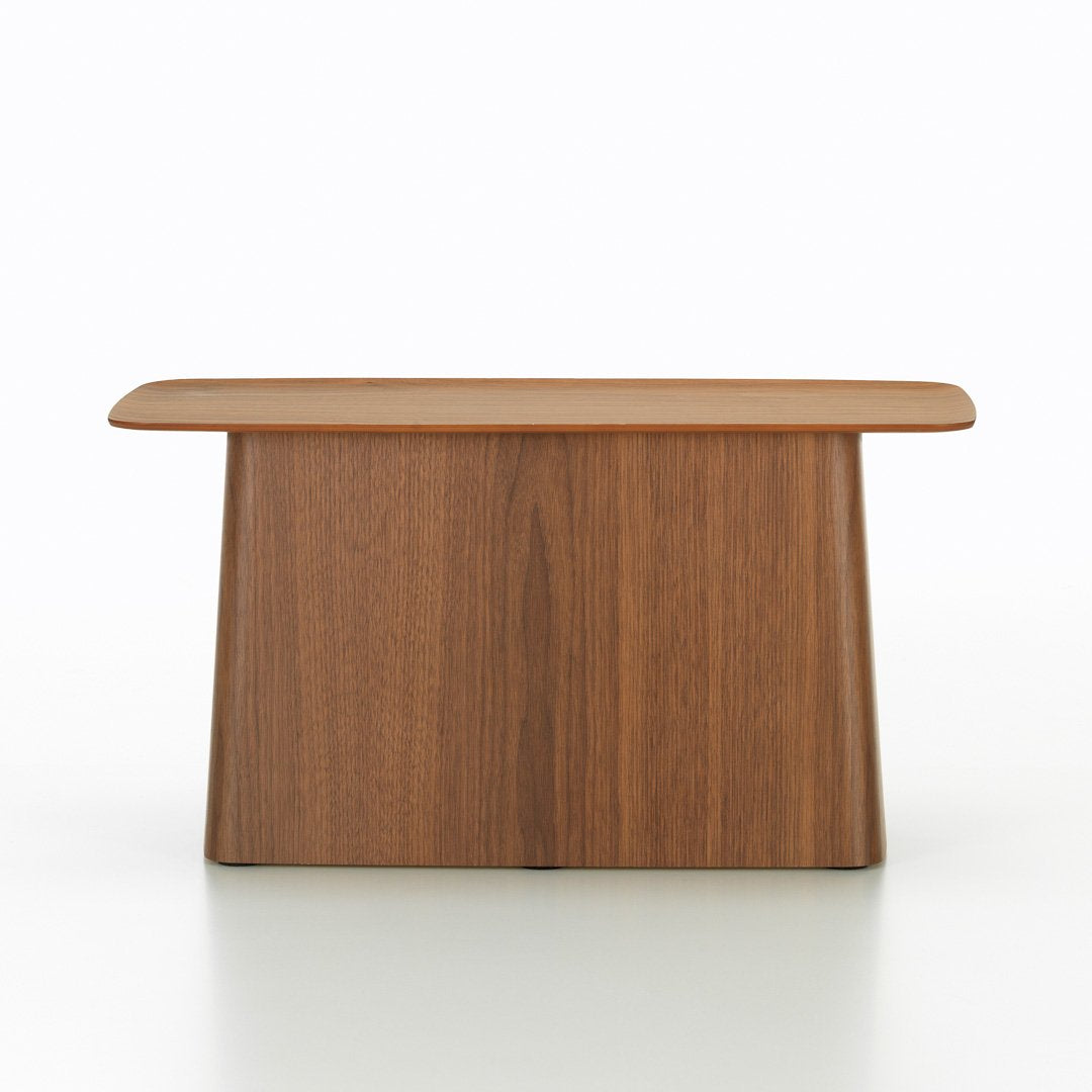 Brown wooden table with a smooth, minimalist design and a flat top, highlighting rich wood grain patterns.