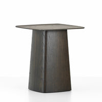 Dark wood accent table with a smooth, square top and tapered base, showcasing a sleek, modern design.