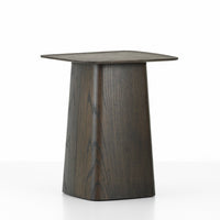 Elegant dark wood table with a smooth, minimalist design and subtle grain patterns. Perfect for modern decor.