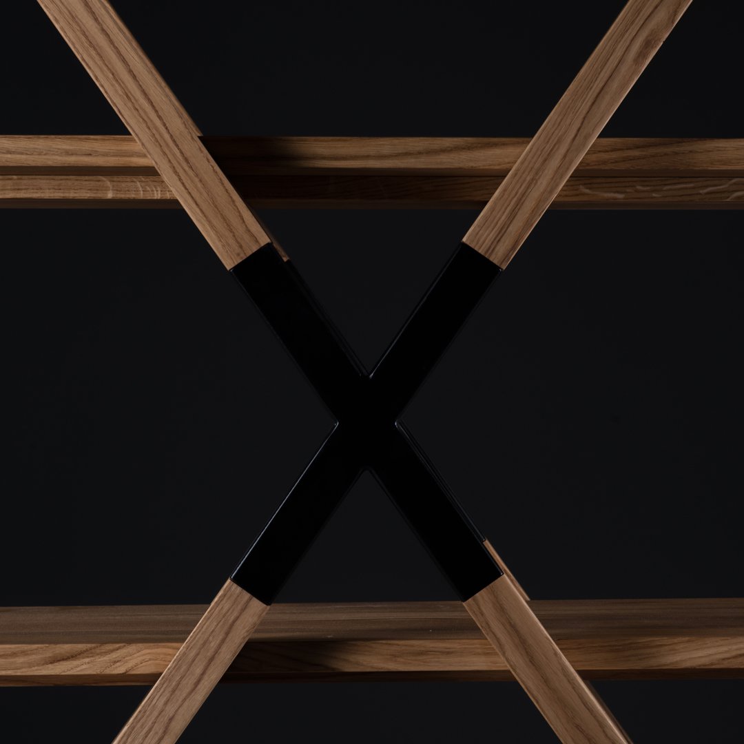 Wooden shelf with a natural finish and sleek black metal accents, featuring a modern crisscross pattern.