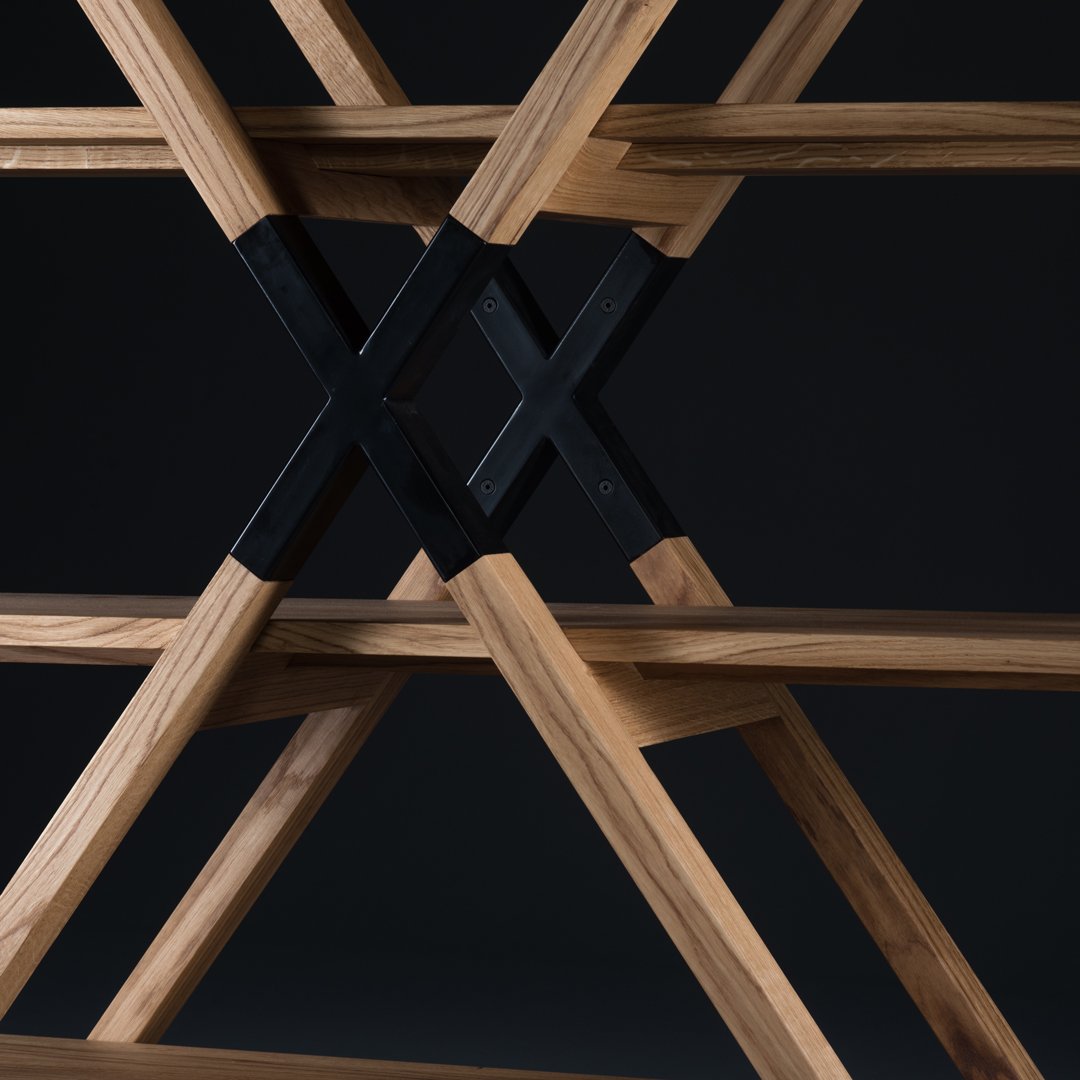 Wooden frame featuring a natural finish with bold black accents and intersecting geometric patterns.
