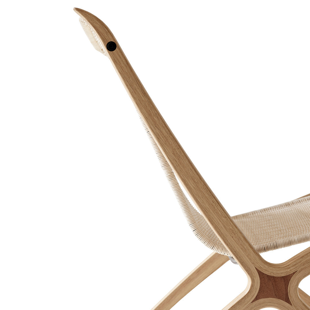 Natural wood grain in light brown, with soft beige fabric creating a minimalist and modern design.