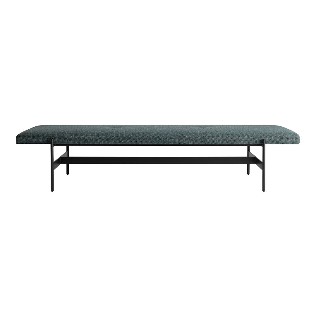 Sleek black metal bench with a solid dark green upholstered seat, featuring a minimalist design and no patterns.