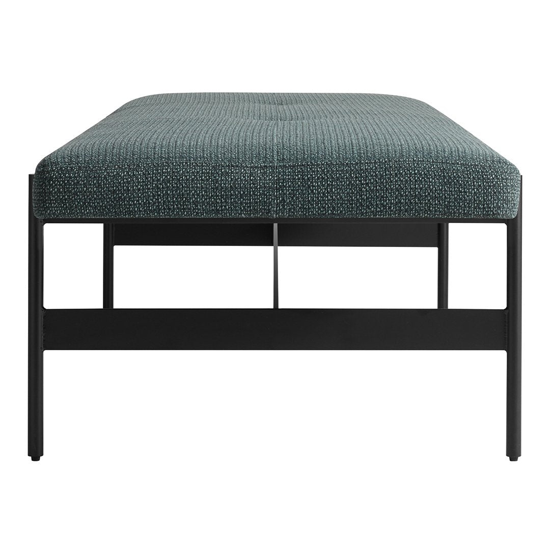 Teal patterned ottoman with a sleek black metal frame. Ideal for modern interior decor.