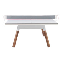 Modern white desk with gray fabric and bright red accents, featuring natural wood legs and minimalist design.