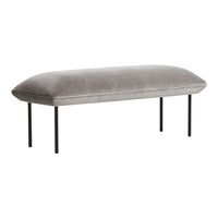 Gray velvet bench with smooth, subtle texture and sleek black metal legs, perfect for modern decor.