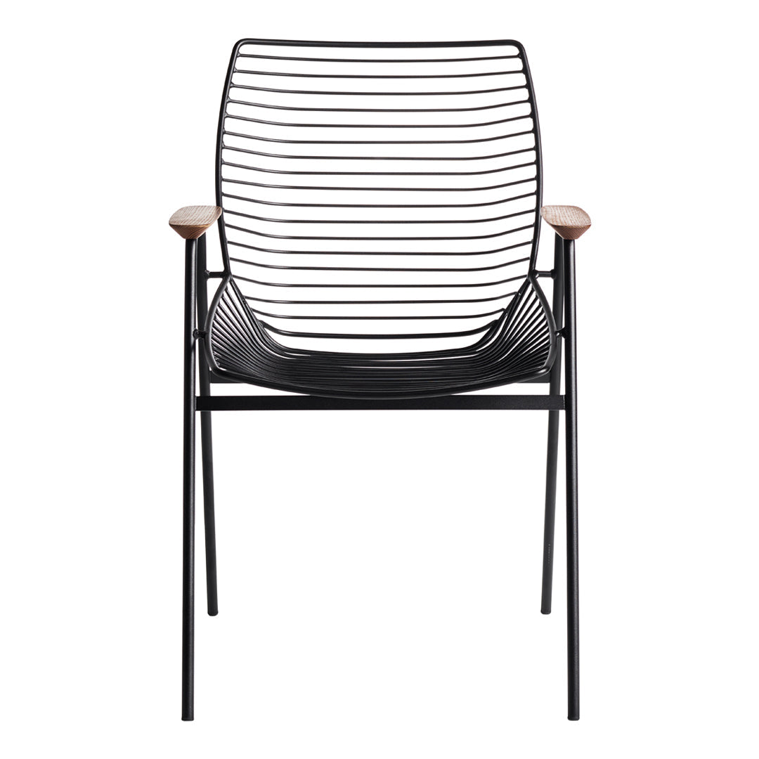 Modern black striped chair with wooden armrests, showcasing a sleek and minimalist design. Perfect for chic interiors.