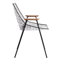 Black wire chair with natural wood accents and a unique ribbed design, perfect for modern decor.