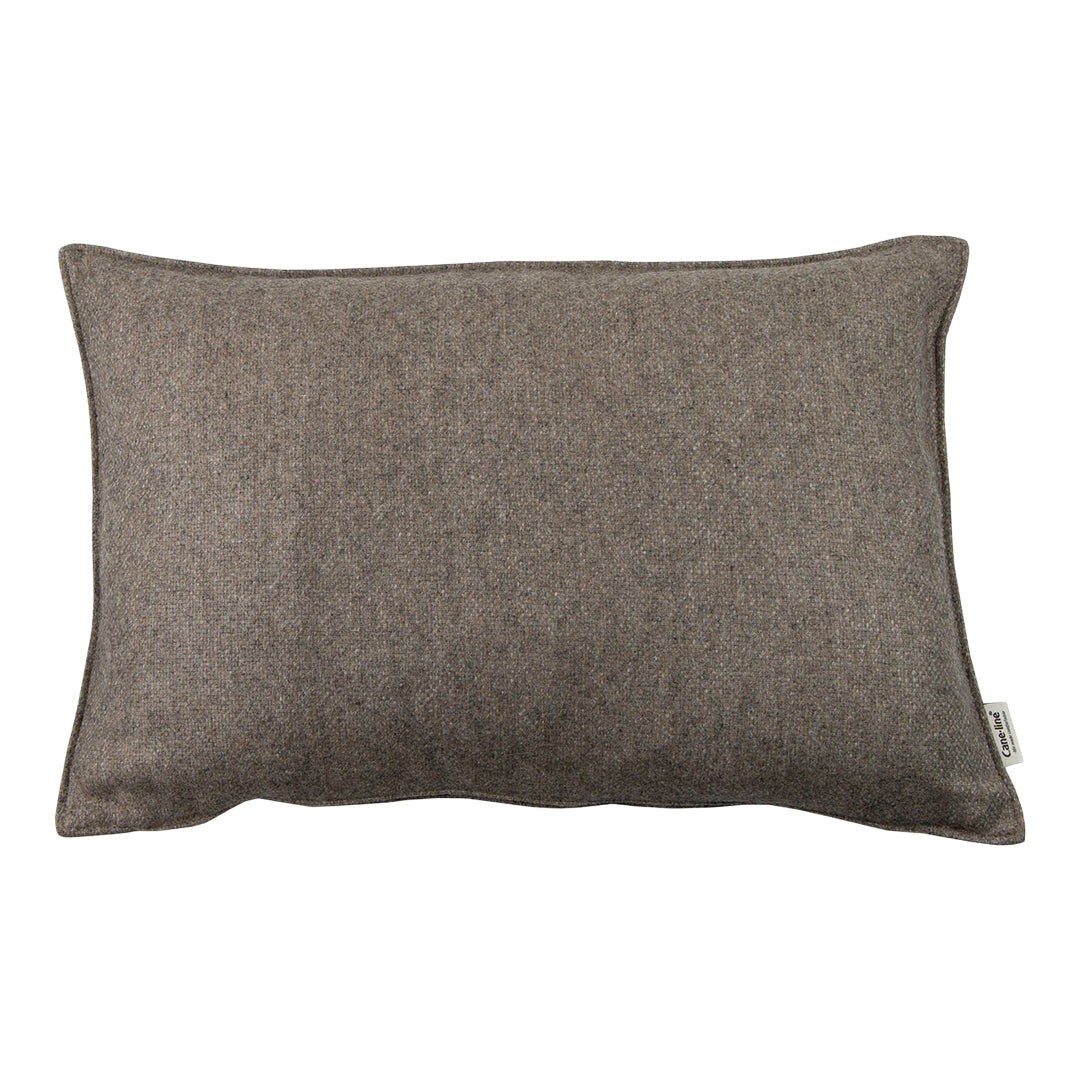 Textured brown pillow with a subtle heather pattern, perfect for adding warmth to any space.