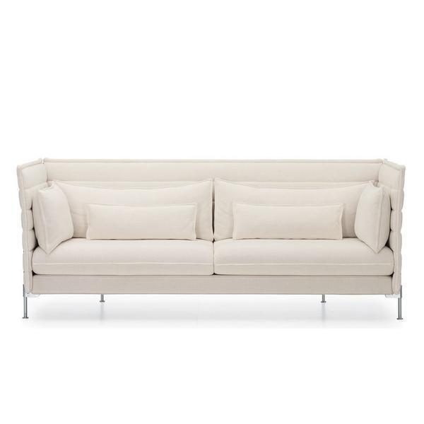Light beige upholstered sofa with smooth, minimalist design and plush cushions, featuring a clean, modern pattern.