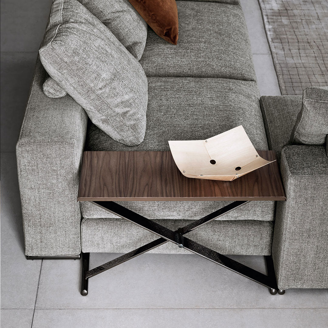 Gray textured sofa with solid wood and metal side table, featuring a dark walnut finish and clean lines.