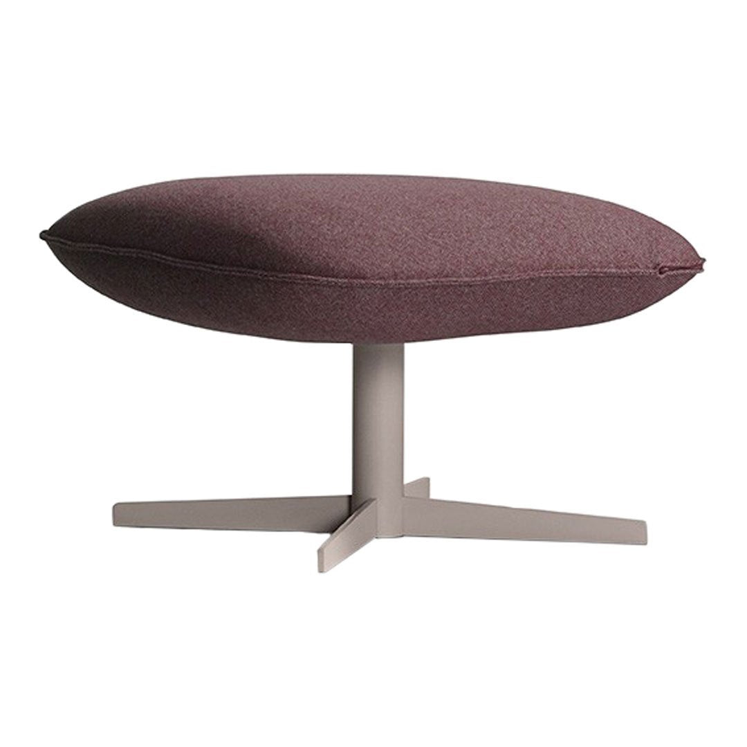 Round burgundy upholstered ottoman with a light gray metal base, featuring a sleek, modern design.