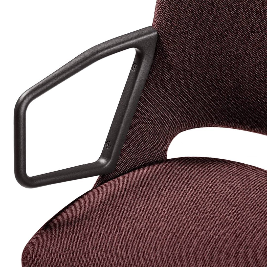 Burgundy textured fabric with a black geometric armrest, offering a modern and sleek design.