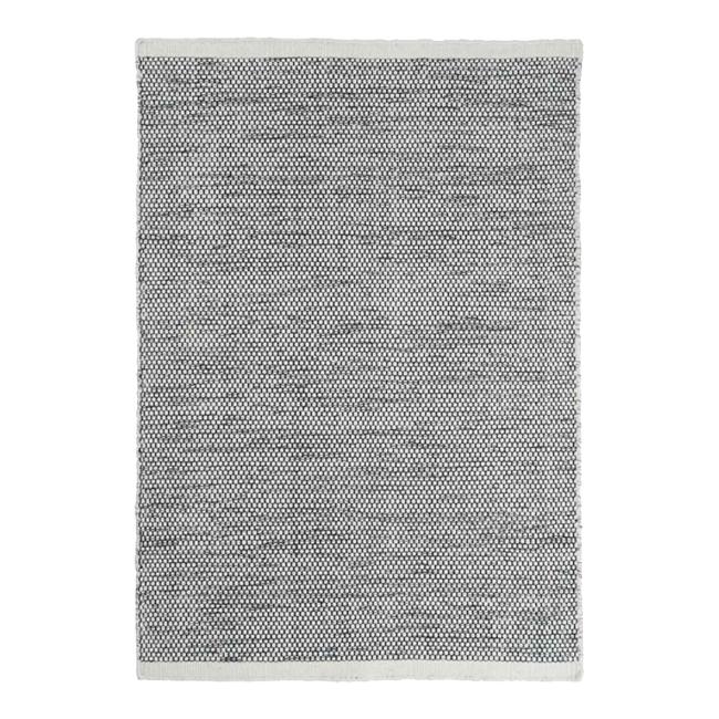 Textured gray rug featuring subtle patterns, perfect for adding a modern touch to any room decor.