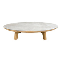 Round coffee table with a smooth gray top and natural wood legs, showcasing a modern, minimalistic design.