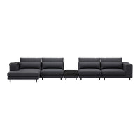Modern sectional sofa in solid charcoal gray with smooth, textured upholstery and sleek black legs.