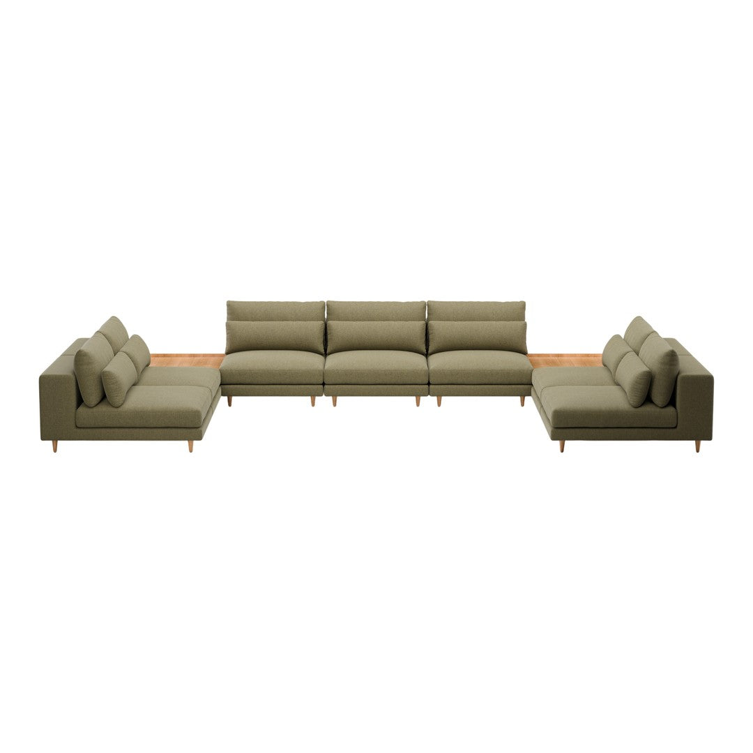 "Modern sectional sofa in muted olive green upholstery with plush cushions and sleek wooden accents."