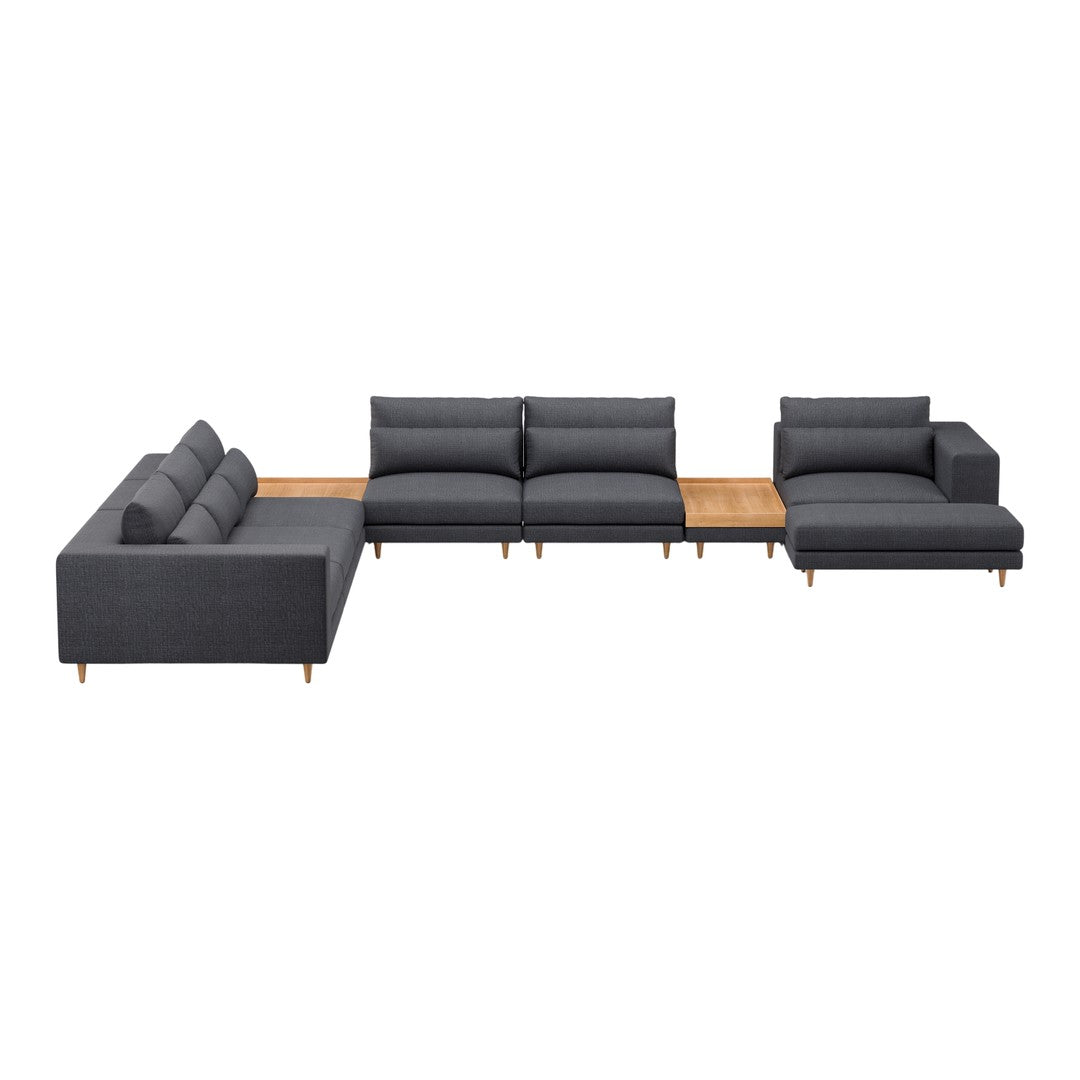 Modern sectional sofa in dark gray fabric with a sleek wooden accent. Perfect for contemporary living spaces.