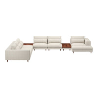 Light beige sectional sofa with smooth fabric and wooden accents, featuring a modern and minimalist design.