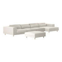 Modern modular sectional sofa in soft white fabric with minimalist design and light wooden legs.