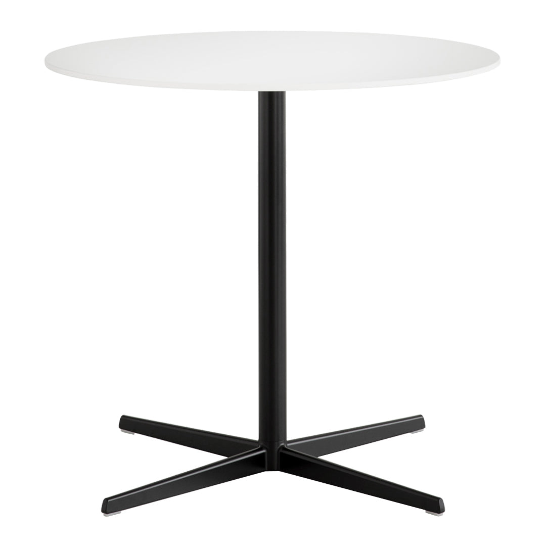 Round white tabletop with a sleek black base and minimalist design, perfect for modern spaces.