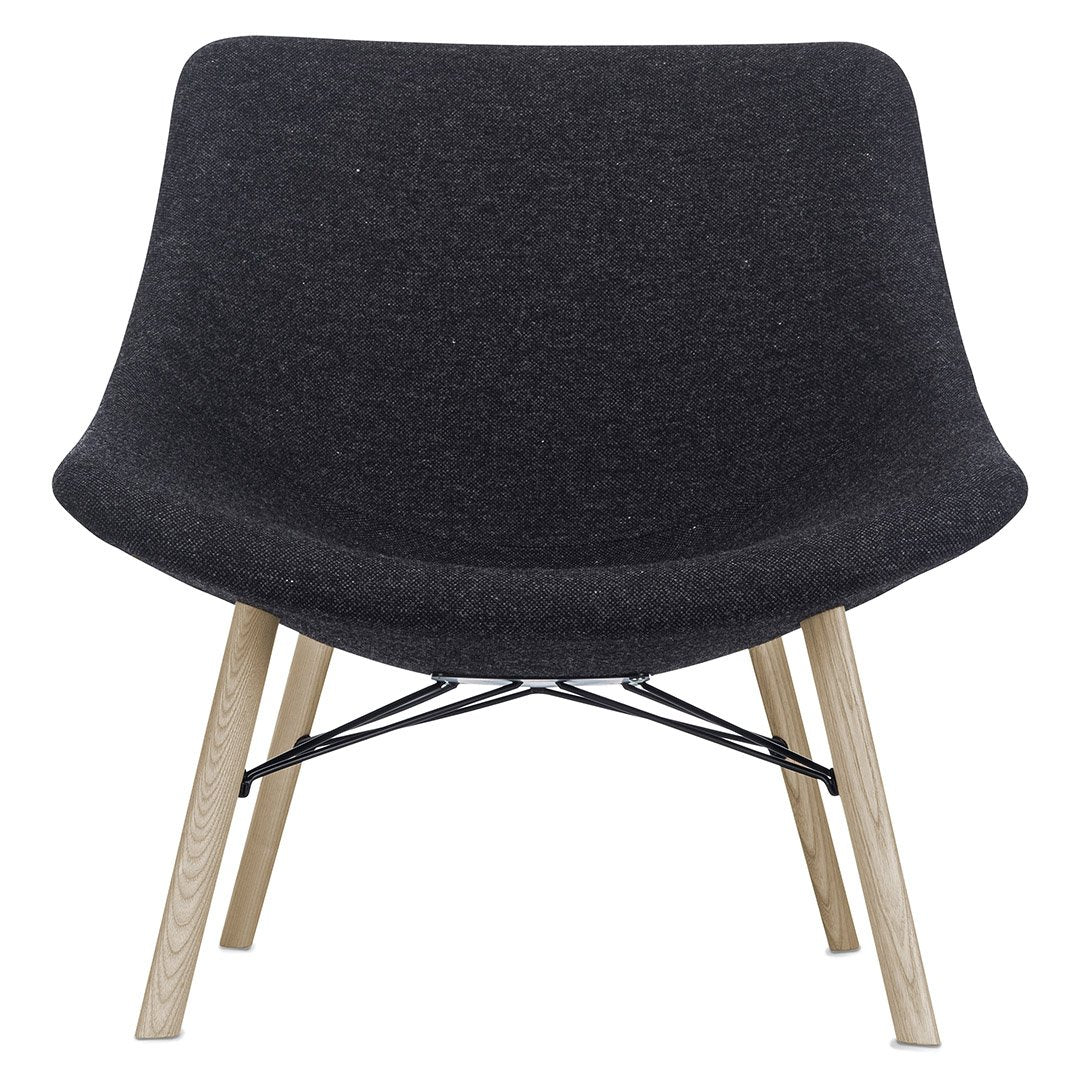 Black upholstered chair with a minimalist design and natural wood legs. Modern and versatile for any decor.