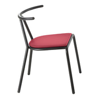 Modern chair with a sleek black frame and vibrant red padded seat, showcasing a minimalist design.